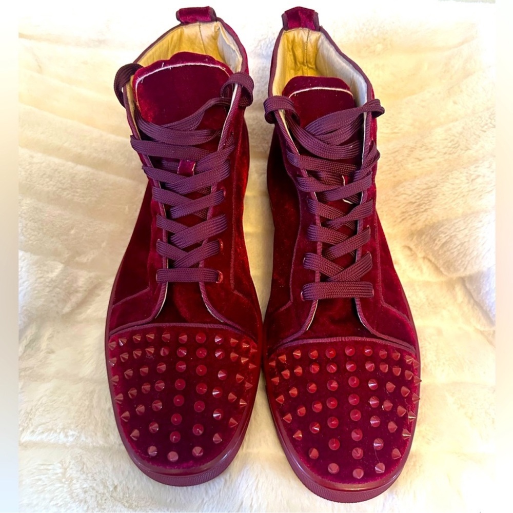 Christian Louboutin high top men’s tennis shoes.